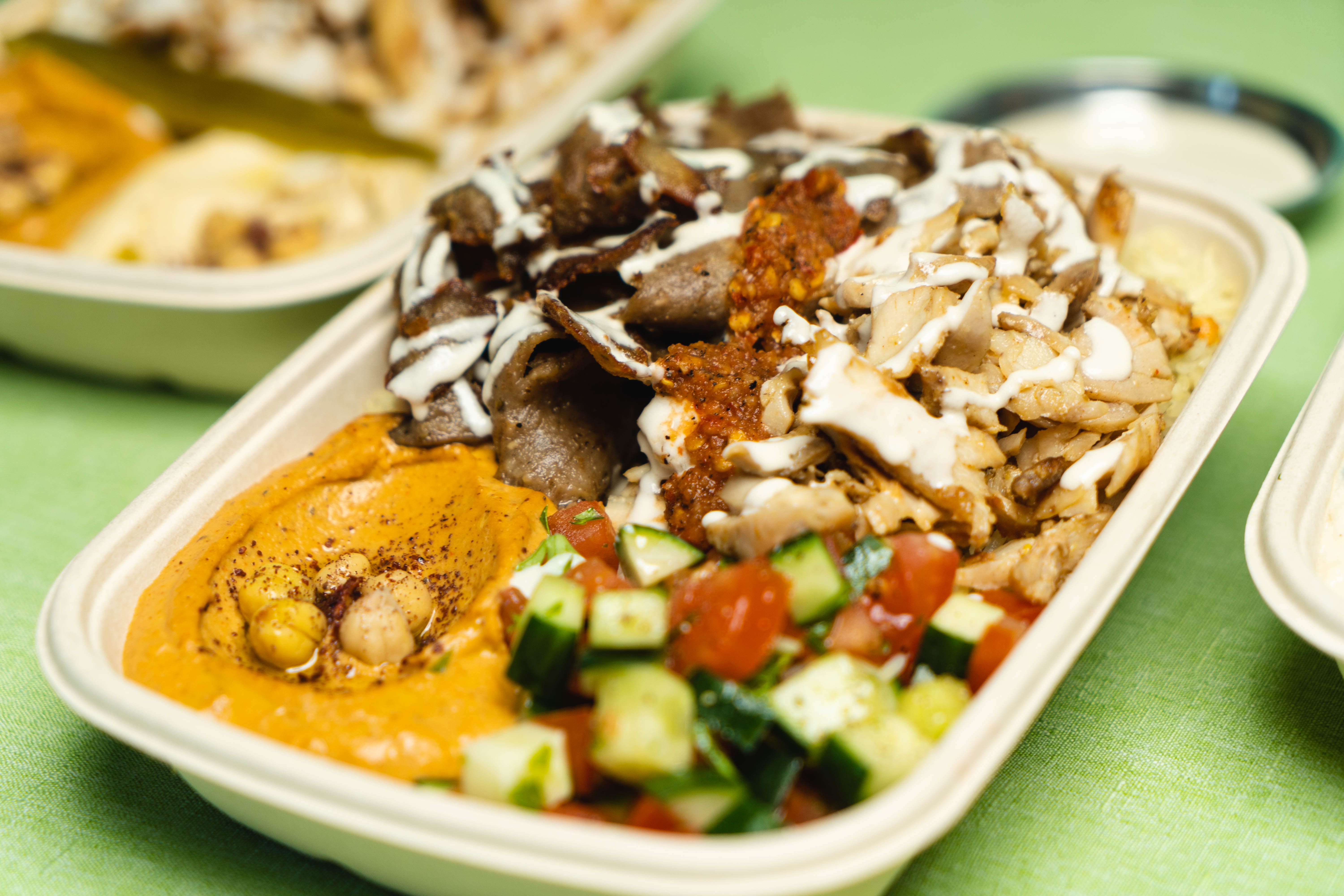 Gyro bowl with house-made sauces and warm pita at Yafa Hummus