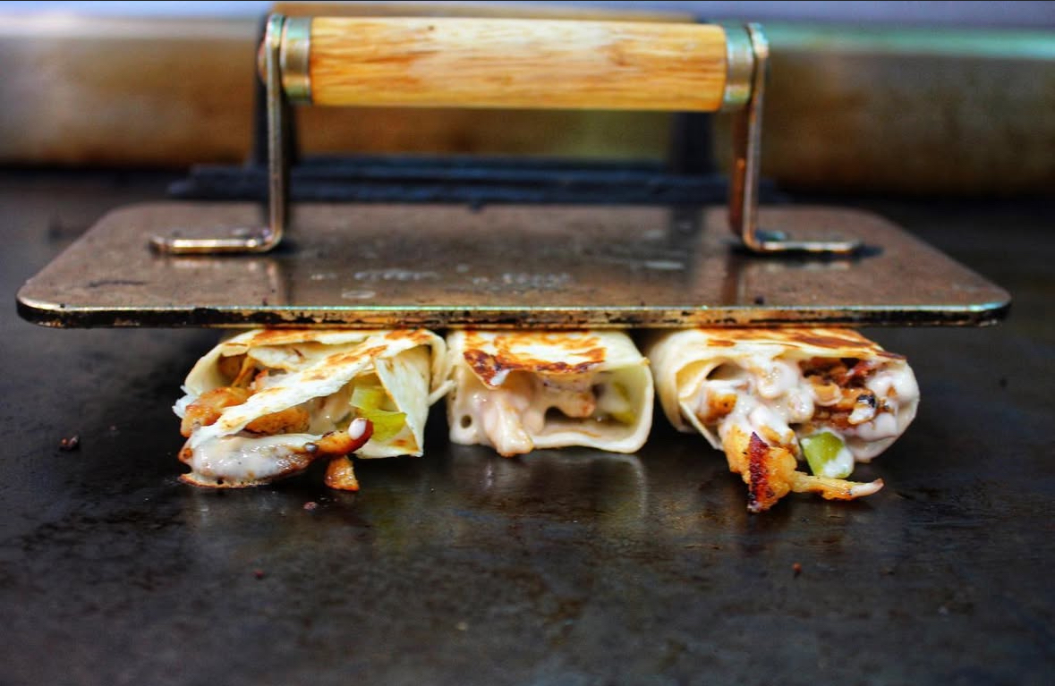 Halal wraps on the grill at Yafa Hummus