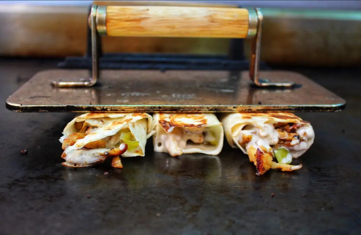 Halal wraps on the grill at Yafa Hummus