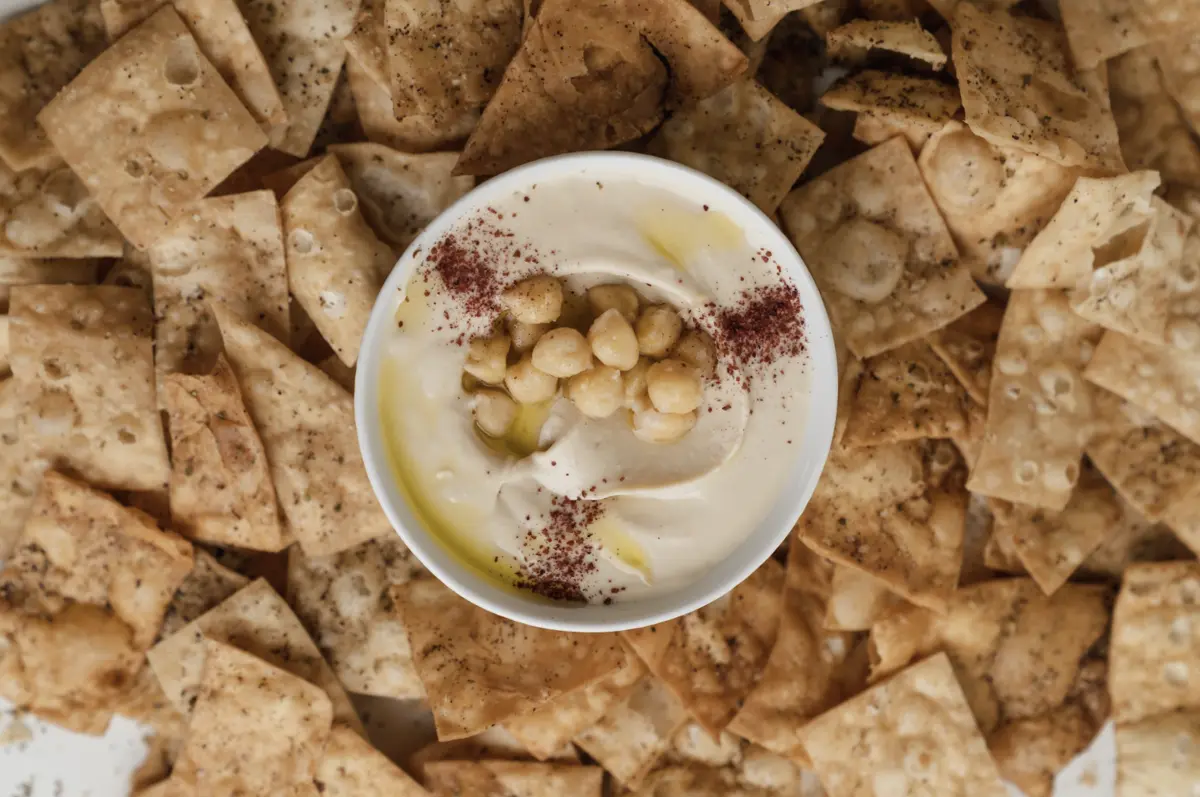 Fresh hummus bowl with pita chips at Yafa Hummus